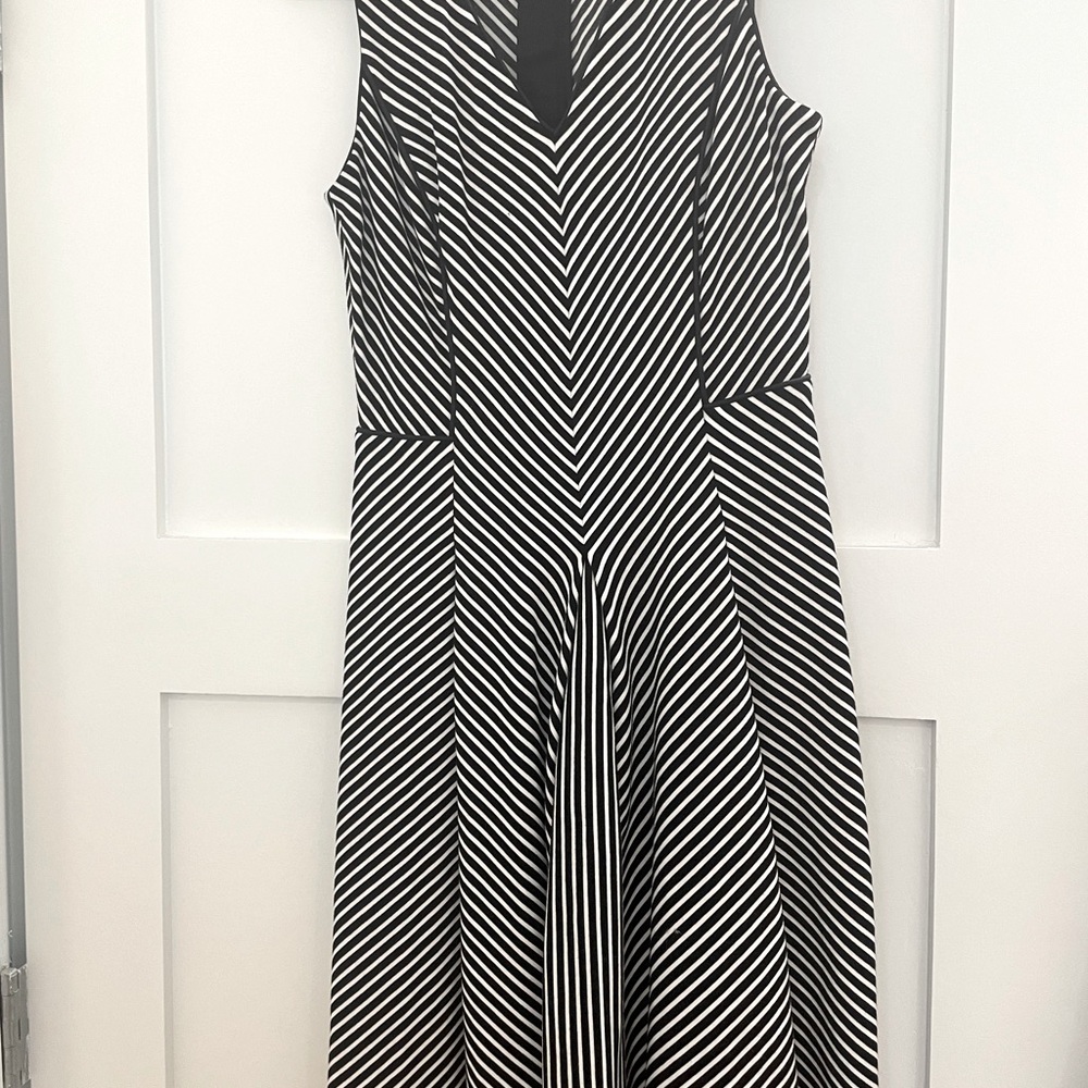Banana Republic. Material is a cross between a scuba and sweatshirt material.